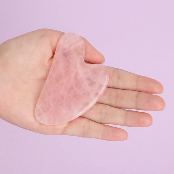 Le masseur facial vibrant quartz rose Gua Sha